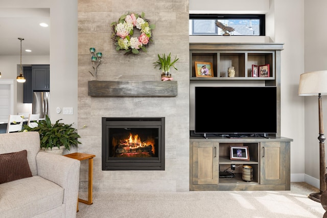 11684 N 23rd Ave, Boise, ID 83714 - living area with a tile fireplace, recessed lighting, and baseboards