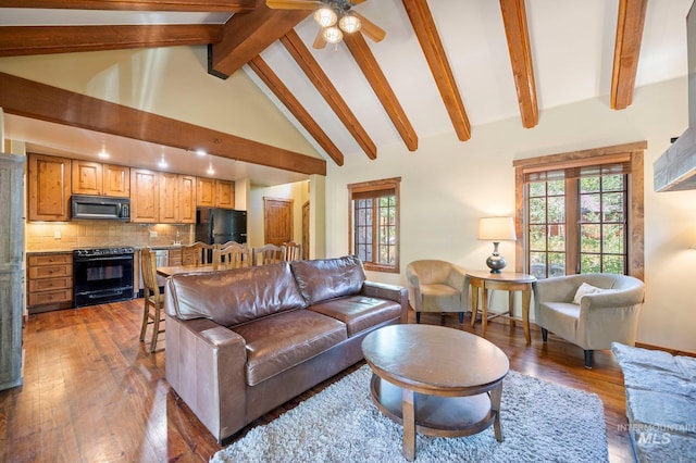 living room featuring ceiling fan, beamed ceiling, dark hardwood / wood-style flooring, and high vaulted ceiling