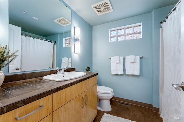 502 S 15th St # 104, Boise, ID 83702 - full bathroom with visible vents, vanity, and toilet