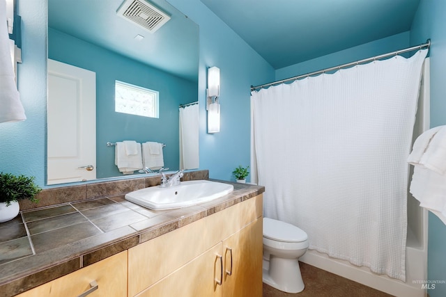 502 S 15th St # 104, Boise, ID 83702 - bathroom with toilet, vanity, and visible vents