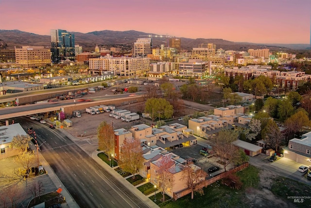 502 S 15th St # 104, Boise, ID 83702 - aerial view at dusk featuring a city view and a mountain view