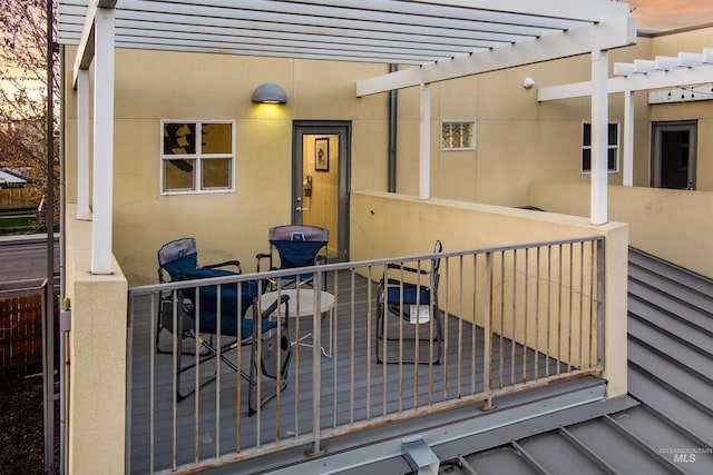 502 S 15th St # 104, Boise, ID 83702 - view of exterior entry with a pergola and stucco siding