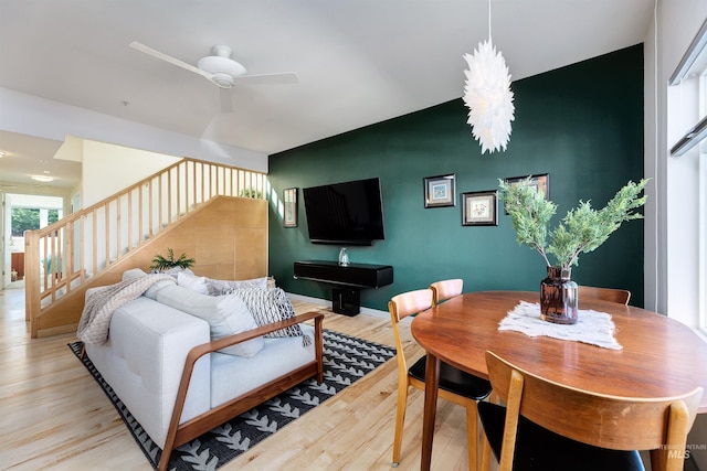 502 S 15th St # 104, Boise, ID 83702 - living area featuring light wood-style flooring, stairway, and a ceiling fan