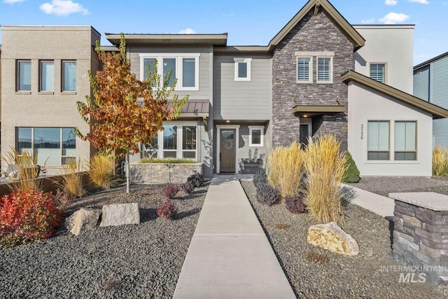 view of front of property featuring stone siding