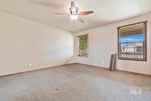11716 S Emerald Rd, Nampa, ID 83686 - empty room with a ceiling fan, carpet floors, and baseboards