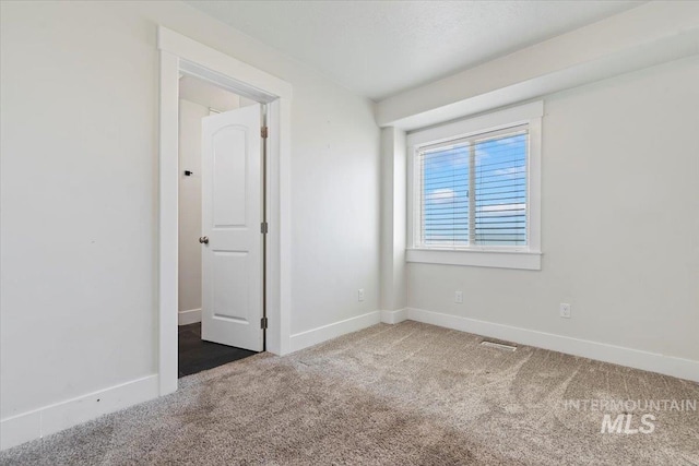 11716 S Emerald Rd, Nampa, ID 83686 - spare room with carpet flooring and baseboards