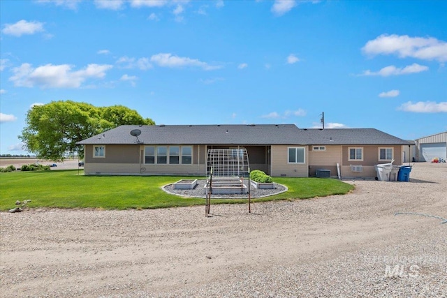 11716 S Emerald Rd, Nampa, ID 83686 - back of house featuring a lawn and central AC unit