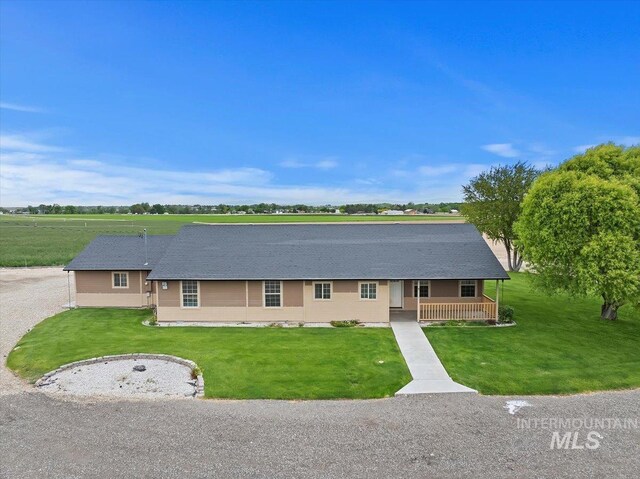 11716 S Emerald Rd, Nampa, ID 83686 - single story home with covered porch and a front yard
