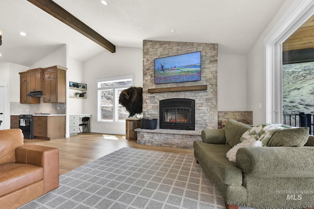 44 Shoemaker Dr, Horseshoe Bend, ID 83629 - living area with light wood-style floors, a stone fireplace, and recessed lighting