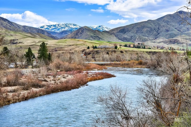 44 Shoemaker Dr, Horseshoe Bend, ID 83629 - view of mountain backdrop with a nearby body of water