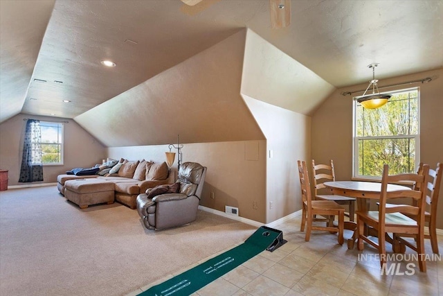 recreation room with light colored carpet and lofted ceiling