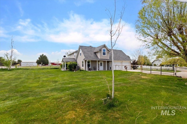 cape cod home with a front yard