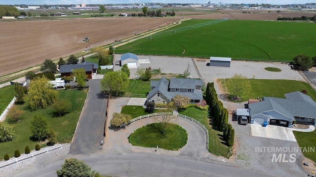 birds eye view of property featuring a rural view