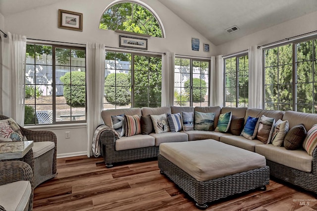 2814 N Cloverdale, Boise, ID 83713 - sunroom / solarium with high vaulted ceiling, plenty of natural light, wood finished floors, and a wooden deck