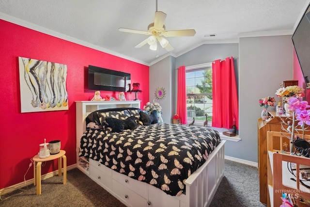 bedroom featuring dark carpet, vaulted ceiling, ceiling fan, and ornamental molding