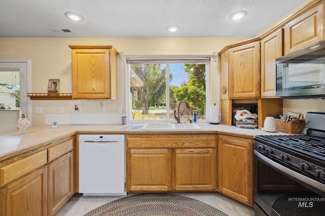 kitchen with sink and stainless steel appliances