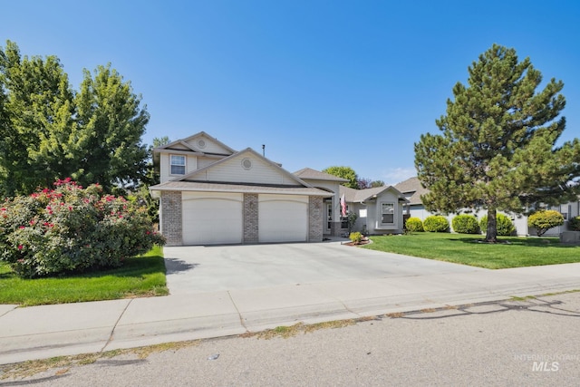 view of front facade featuring a front yard and a garage