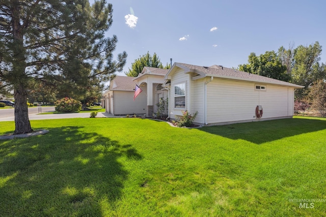 exterior space with a lawn