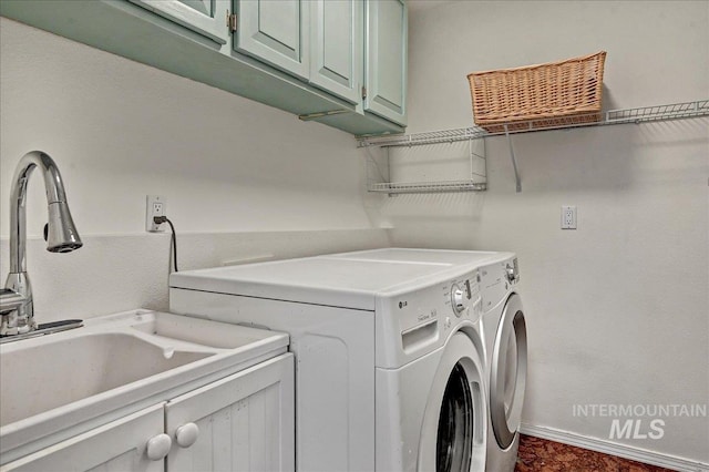 2942 E Eastgate Dr, Boise, ID 83716 - washroom with cabinet space, washing machine and dryer, and baseboards