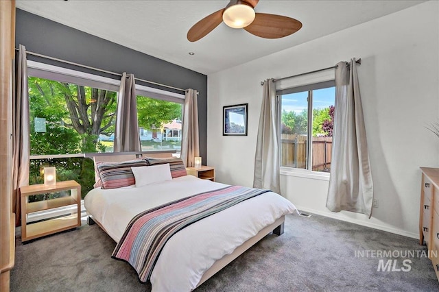 2942 E Eastgate Dr, Boise, ID 83716 - bedroom featuring carpet flooring, multiple windows, and a ceiling fan