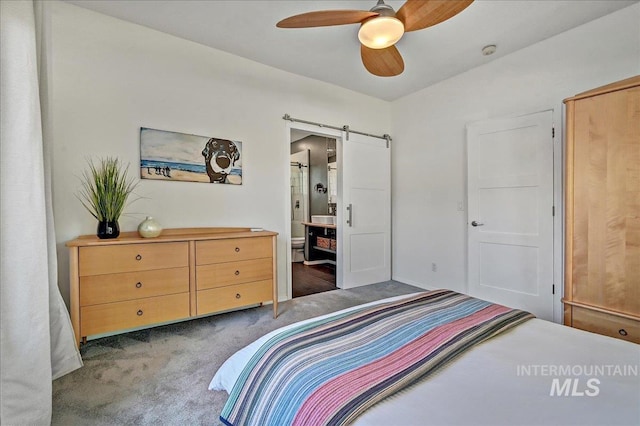 2942 E Eastgate Dr, Boise, ID 83716 - bedroom featuring a barn door, carpet, ensuite bathroom, and ceiling fan