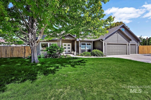 2942 E Eastgate Dr, Boise, ID 83716 - view of front of property featuring a garage, driveway, and french doors
