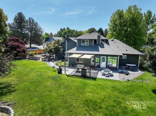 2942 E Eastgate Dr, Boise, ID 83716 - back of house with a patio, a fire pit, a chimney, and a shingled roof