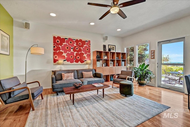 2942 E Eastgate Dr, Boise, ID 83716 - living area with a ceiling fan, wood finished floors, and recessed lighting
