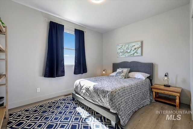 837 Trout Creek Way, Kimberly, ID 83314 - bedroom featuring wood finished floors and baseboards