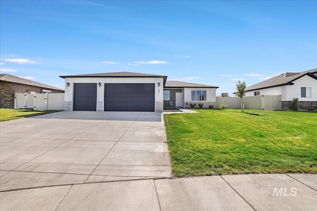 837 Trout Creek Way, Kimberly, ID 83314 - prairie-style home featuring concrete driveway, a garage, and a gate