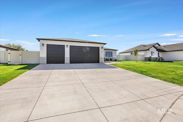 837 Trout Creek Way, Kimberly, ID 83314 - view of front facade with a garage, a gate, and stone siding