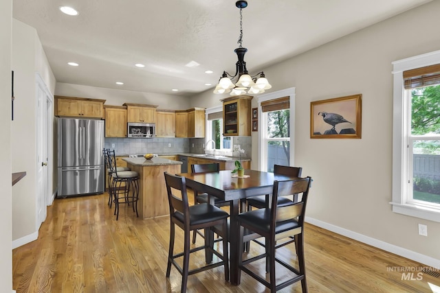 3031 N Christian Way, Meridian, ID 83646 - dining area with a chandelier, light wood-type flooring, and recessed lighting