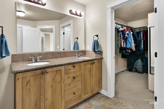 3031 N Christian Way, Meridian, ID 83646 - bathroom with double vanity and a walk in closet