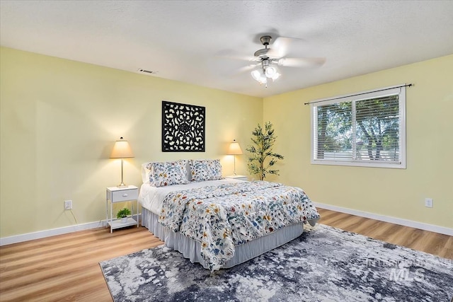 2888 W Wilder St, Meridian, ID 83642 - bedroom with wood finished floors and ceiling fan