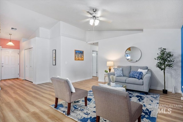 2888 W Wilder St, Meridian, ID 83642 - living area with lofted ceiling, ceiling fan, and light wood-type flooring