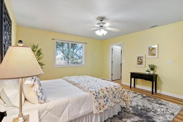 2888 W Wilder St, Meridian, ID 83642 - bedroom with wood finished floors and ceiling fan