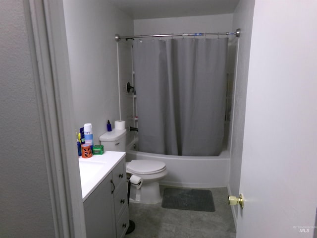 full bathroom with shower / tub combo, toilet, and vanity