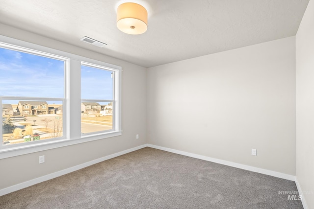 empty room with carpet floors