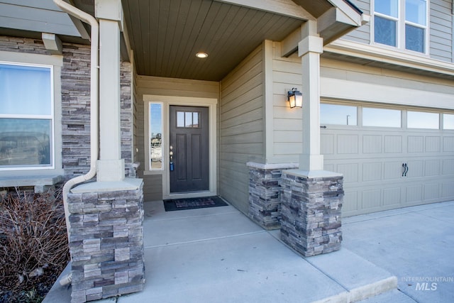 property entrance featuring a garage