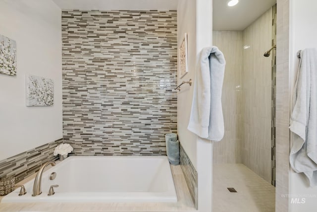 12371 S Abbott Downing Way, Nampa, ID 83686 - full bathroom featuring recessed lighting, a bath, and a shower stall