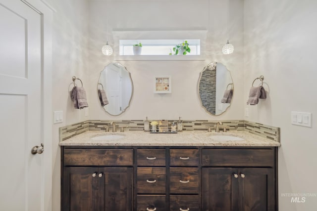 12371 S Abbott Downing Way, Nampa, ID 83686 - bathroom with a sink and double vanity