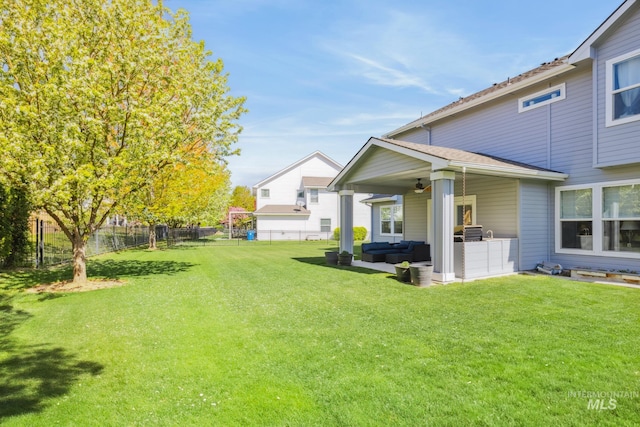 12371 S Abbott Downing Way, Nampa, ID 83686 - view of yard featuring a patio, outdoor lounge area, a ceiling fan, and a fenced backyard