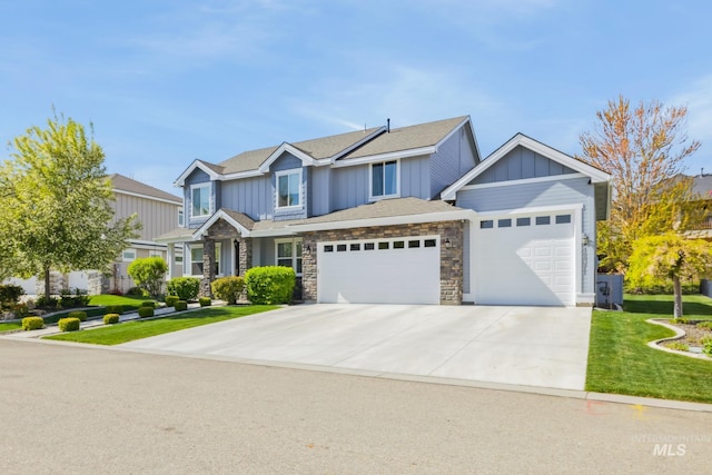 12371 S Abbott Downing Way, Nampa, ID 83686 - craftsman inspired home with an attached garage, a front lawn, stone siding, board and batten siding, and driveway
