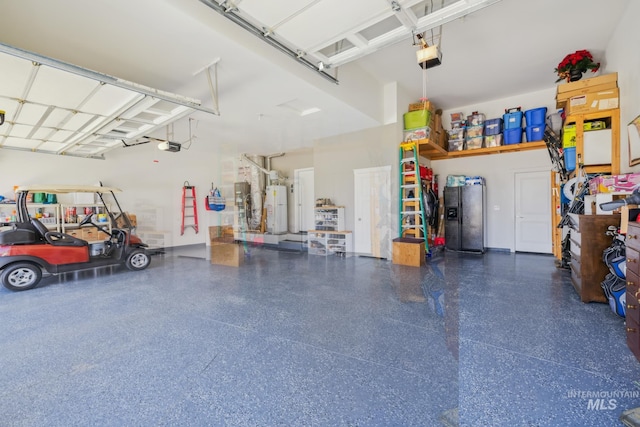 12371 S Abbott Downing Way, Nampa, ID 83686 - garage featuring a garage door opener, gas water heater, and fridge with ice dispenser