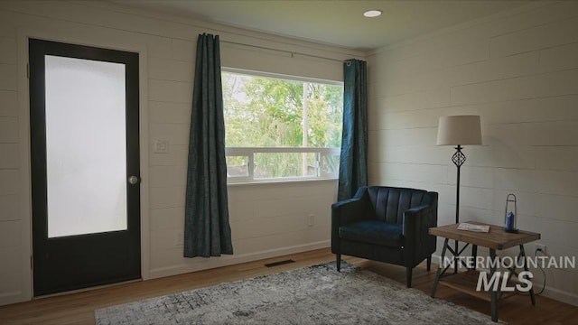 living area featuring wood-type flooring