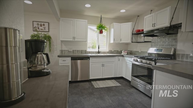 kitchen featuring white cabinetry, appliances with stainless steel finishes, and sink