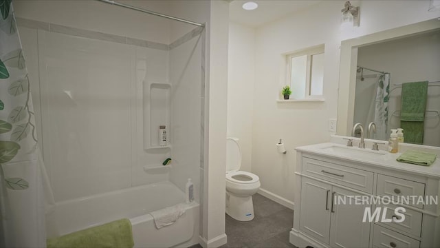 full bathroom featuring vanity, shower / bath combination with curtain, and toilet