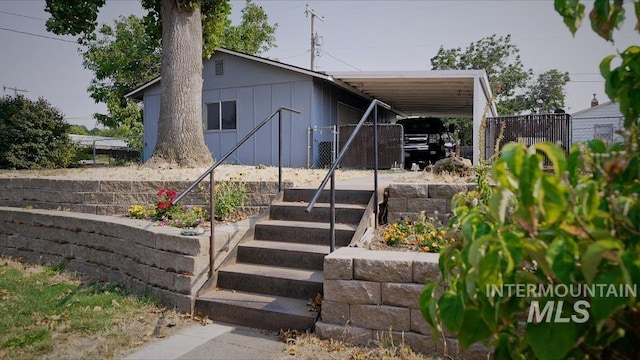 exterior space featuring a carport