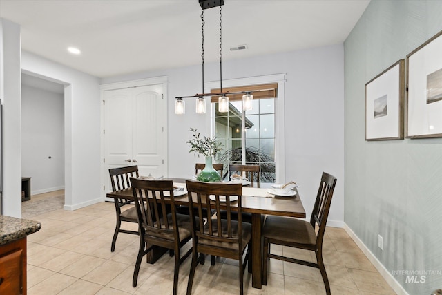 dining room featuring light tile patterned floors