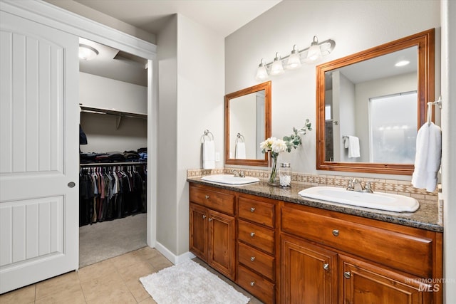 bathroom with vanity and tile patterned floors